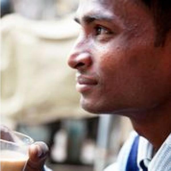 image of a man drinking coffee